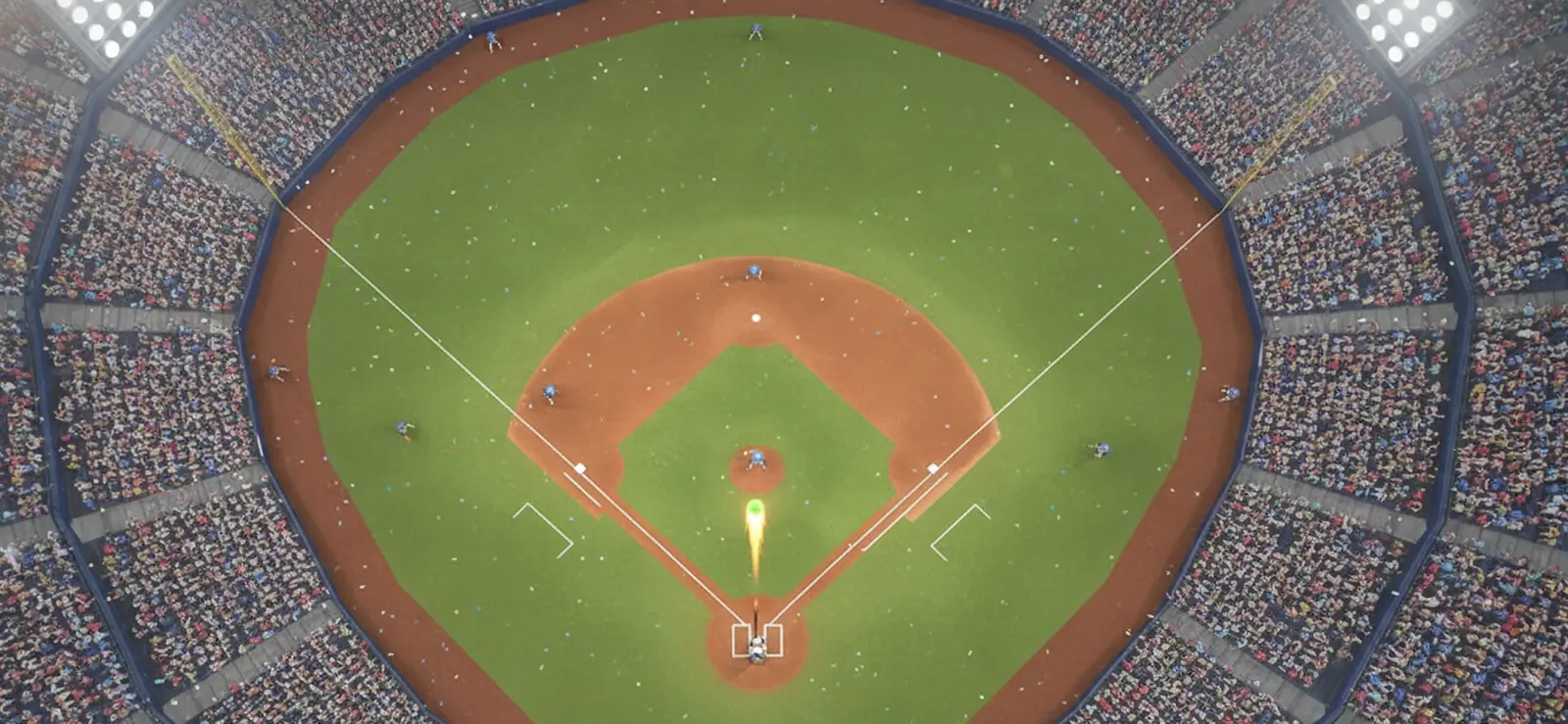 Estádio de softbol iluminado visto do alto durante uma partida em Queens of the Diamond